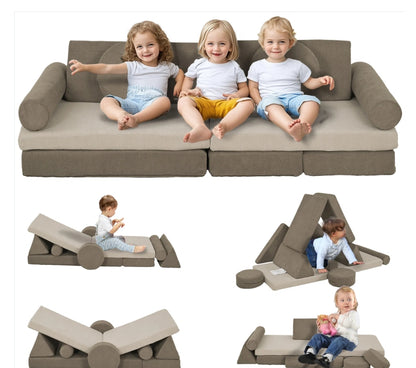 Children sitting on a transforming sofa with additional play features.