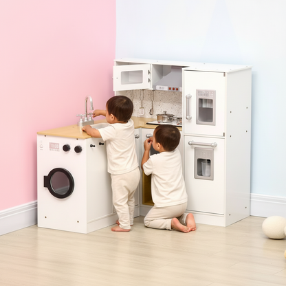 Two children playing with a toy kitchen set in a room with pink walls.