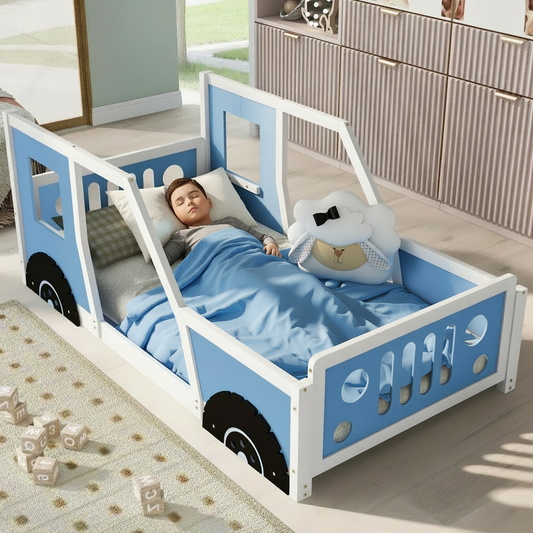 Child's bed designed like a blue car with a child sleeping inside, surrounded by toys.
