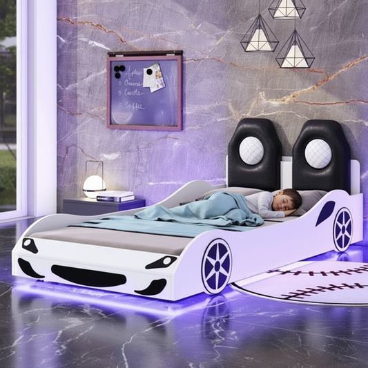 Child lying on a car-shaped bed in a modern bedroom with marble walls.