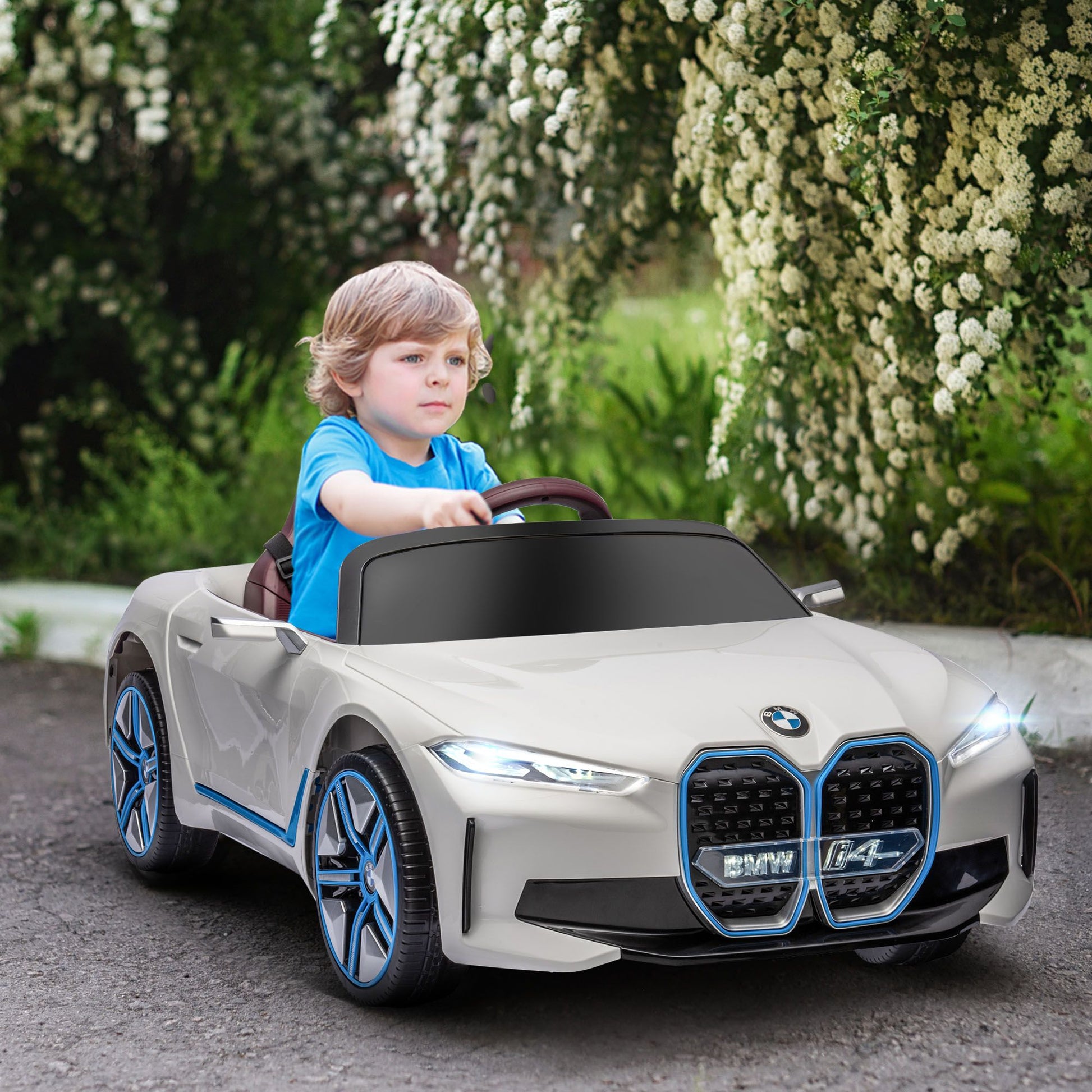 White BMW LuxeDrive 12V kids electric ride-on car by Little Play World with parental remote control, designed for children.
