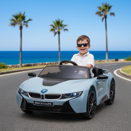 Child driving a toy BMW i8 Coupe on a road with palm trees and ocean in the background