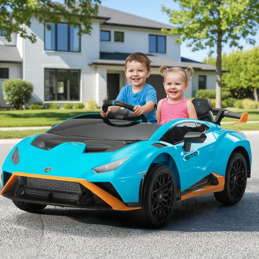Two children in a blue toy car on a driveway with a house and trees in the background.