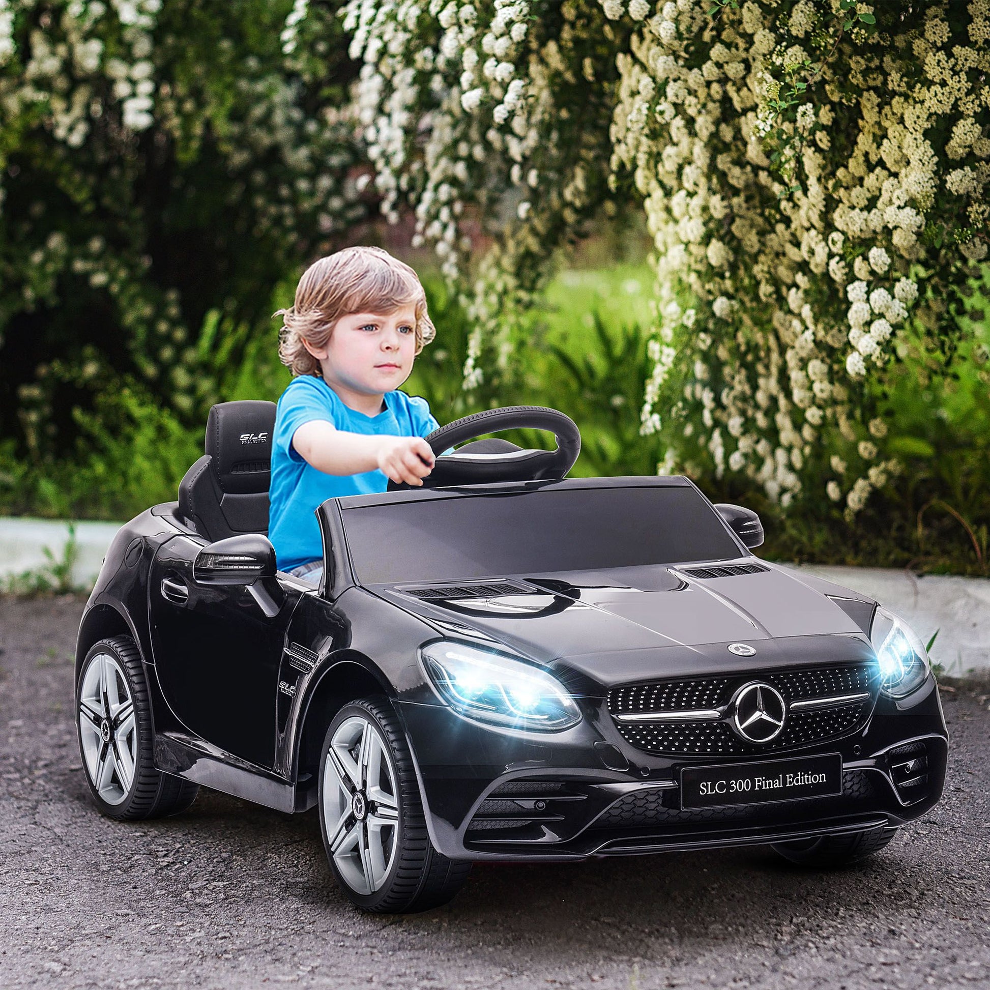 Black Mercedes-Benz Veloce 12V dual-seat kids electric ride-on car with parental remote by Little Play World.